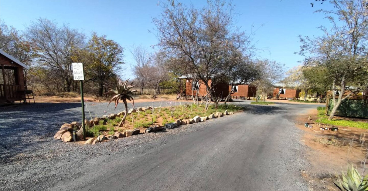 Secure entrance gate to Maseri Cabins with 24/7 security